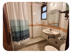 Bathroom in 3 BHK Builder Floor at Pamposh Enclave – for Rent