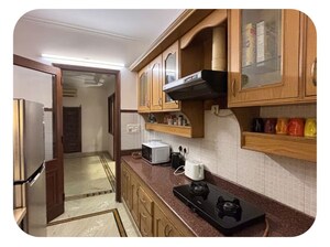 Kitchen in 3 BHK Builder Floor at Pamposh Enclave – for Rent