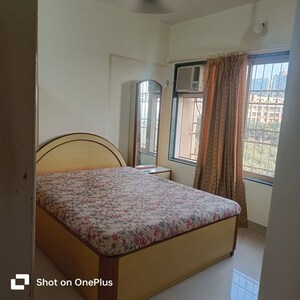 Bedroom in 1 BHK Apartment at Sai Mangal CHS Kandivali, Kandivali West – for Rent