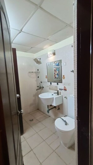 Bathroom in 3 BHK Apartment at Aditya Celebrity Homes, Sector 76 – for Rent