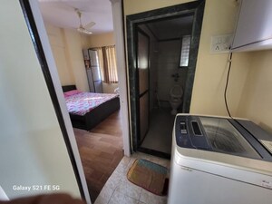 Corridor in 2 BHK Apartment at Asha Nagar CHS, Mulund West – for Sale