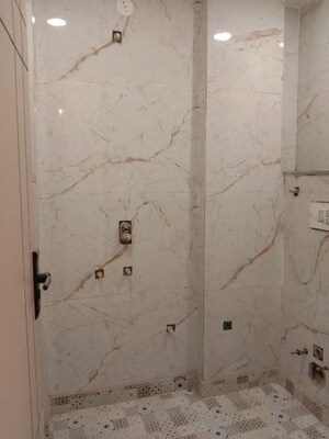 Bathroom in 3 BHK Builder Floor at Dwarka Mor – for Sale