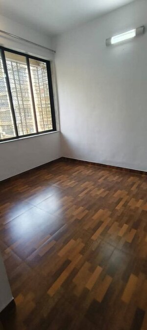 Bedroom in 2 BHK Apartment at Vasant Sagar, Kandivali East – for Sale