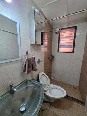 Bathroom in 2 BHK Apartment at DGS Sheetal Dharmaraj, Malad West – for Sale
