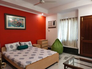 Bedroom in 3 BHK Builder Floor at Nehru Enclave – for Rent