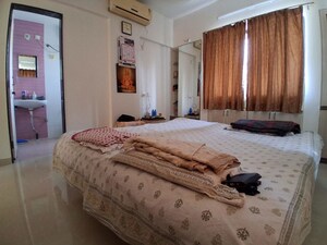 Bedroom in 2 BHK Apartment at Karve Nagar – for Sale