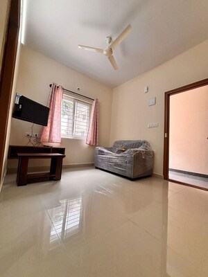 Living Room in 1 BHK Apartment at Indiranagar – for Rent
