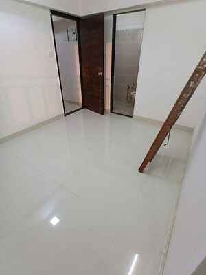 Staircase in 2 BHK Apartment at Dynamix Divum, Malad East – for Rent