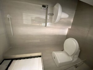 Bathroom in 1 BHK Apartment at Runwal Gardens, Dombivli East – for Rent