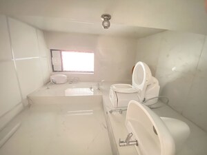 Bathroom in 1 BHK Apartment at Runwal Gardens, Dombivli East – for Rent