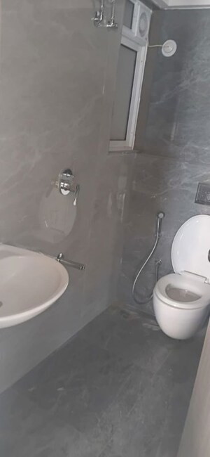 Bathroom in 1 BHK Apartment at Swastik Coral, Tagore Nagar – for Rent