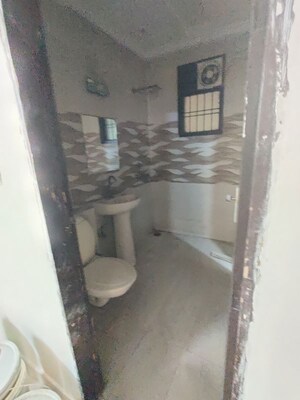 Bathroom in 4 BHK Builder Floor at Green Fields Colony – for Rent