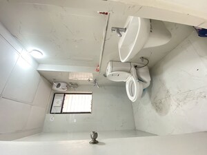 Bathroom in 1 BHK Apartment at Runwal Gardens, Dombivli East – for Rent