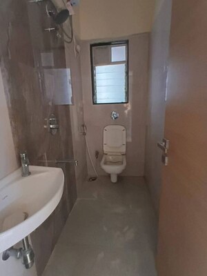 Bathroom in 1 BHK Apartment at K Raheja Raheja Residency, Malad East – for Rent