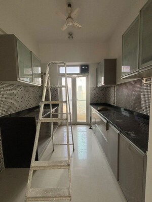 Kitchen in 2 BHK Apartment at Omkar Alta Monte, Malad East – for Rent