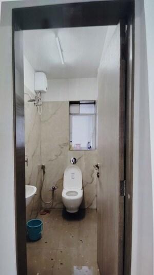 Bathroom in 1 BHK Apartment at Shraddha Vertica, Vikhroli East – for Rent