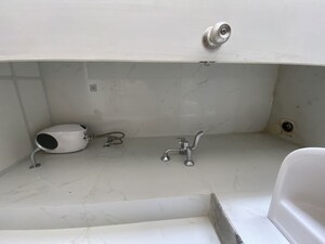 Bathroom in 1.5 BHK Apartment at Runwal Gardens, Dombivli East – for Rent