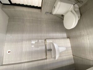 Bathroom in 1 BHK Apartment at Runwal Gardens, Dombivli East – for Rent