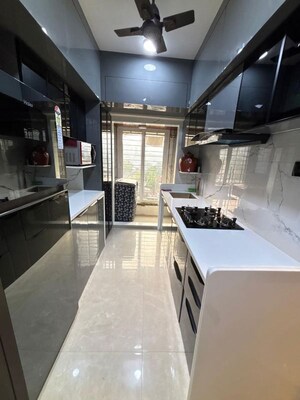 Kitchen in 1 BHK Apartment at Shraddha Vertica, Vikhroli East – for Rent