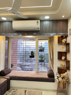 Living Room in 1 BHK Apartment at Shraddha Vertica, Vikhroli East – for Rent