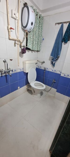 Master Bedroom in 2 BHK Apartment at Vrindavan CHS Airoli, Gothivali Village – for Sale