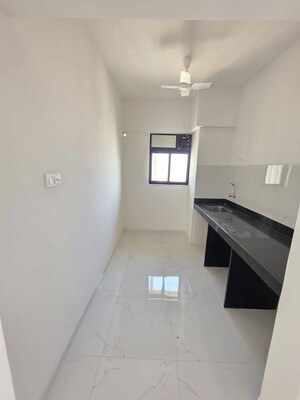 Kitchen in 2 BHK Apartment at Runwal Gardens Phase 3, Dombivli East – for Rent