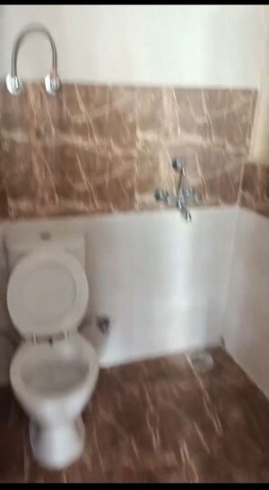 Bathroom in 2.5 BHK Apartment at SVP Gulmohur Garden, Raj Nagar Extension – for Rent