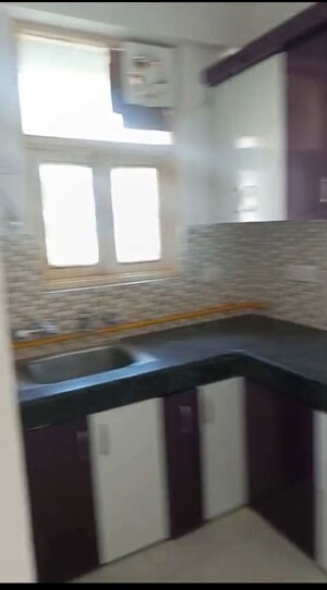 Kitchen in 2.5 BHK Apartment at SVP Gulmohur Garden, Raj Nagar Extension – for Rent