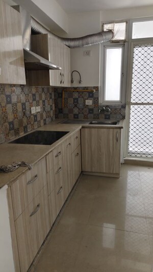 Kitchen in 2 BHK Apartment at Great Value Sharanam, Sector 107 – for Rent