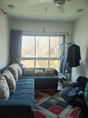 Living Room in 1 BHK Apartment at Sadguru Towers, Goregaon East – for Rent