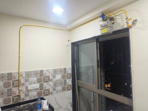 Living Room in 1 BHK Apartment at Runwal Eirene, Balkum Pada – for Rent