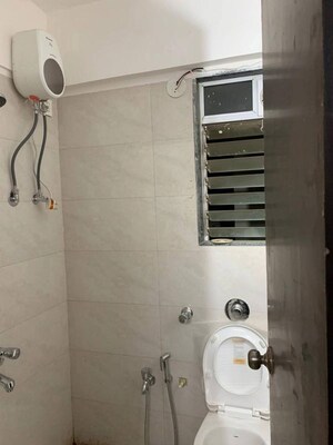 Bathroom in 1 BHK Apartment at DGS Heights, Goregaon East – for Rent