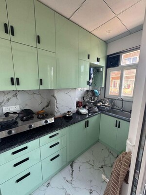 Kitchen in 1.5 BHK Builder Floor at Ansal Plaza Sector-23, Sector 23 – for Rent