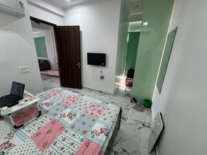 Bedroom in 1.5 BHK Builder Floor at Ansal Plaza Sector-23, Sector 23 – for Rent