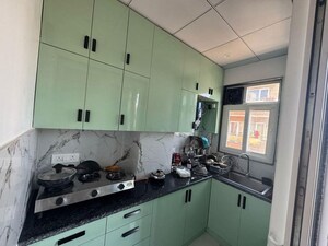 Kitchen in 1.5 BHK Builder Floor at Ansal Plaza Sector-23, Sector 23 – for Rent