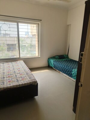 Bedroom in 2 BHK Apartment at Pimple Saudagar – for Rent