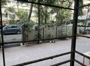 Balcony in 2 BHK Apartment at Shyam Niwas CHS, Cumbala Hill – for Sale