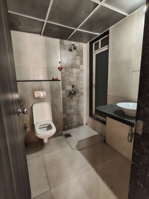 Bathroom in 2 BHK Apartment at JP North Estella, Mira Road – for Rent