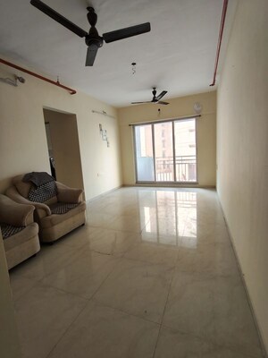 Living Room in 2 BHK Apartment at JP North Estella, Mira Road – for Rent