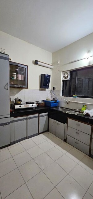 Kitchen in 2 BHK Apartment at Sarala Roses, Baner – for Rent