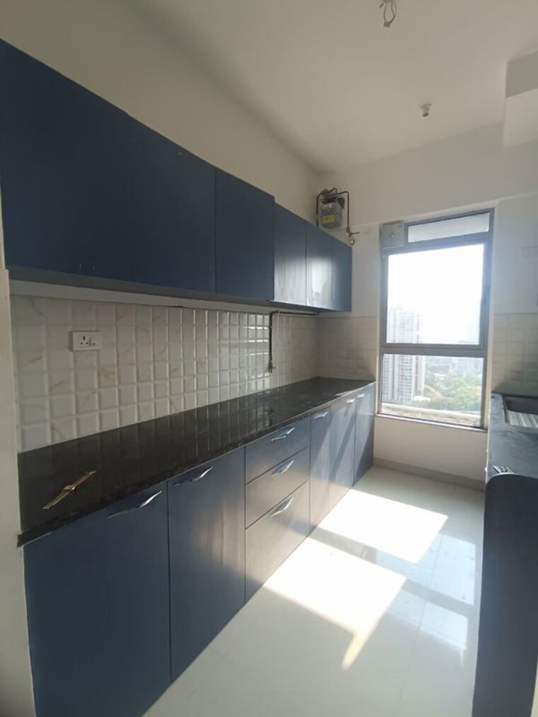 Kitchen, kalpataru-immensa 2 Bedroom 808 Sq.Ft. Apartment In Kolshet Road Thane 10206684