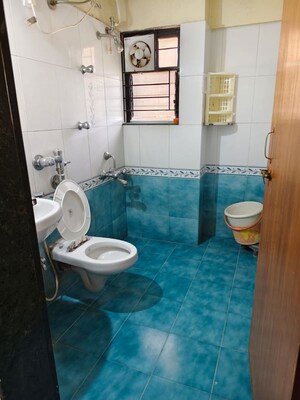 Bathroom in 4 BHK Apartment at Kapil Malhar Apartment, Baner – for Rent
