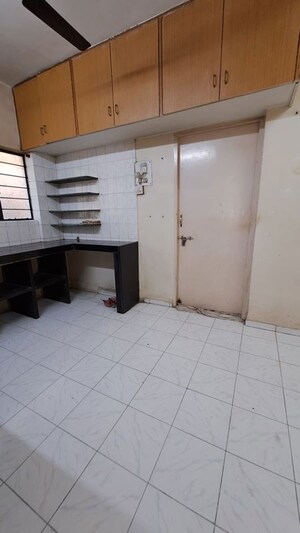 Kitchen in 1.5 BHK Apartment at Radha Krishna Apartment Vadhgaon, Vadgaon Budruk – for Rent