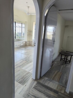 Building Lobby in 2 BHK Apartment at Sanjeev Enclave, Andheri West – for Rent