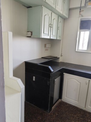 Kitchen in 2 BHK Apartment at Sanjeev Enclave, Andheri West – for Rent