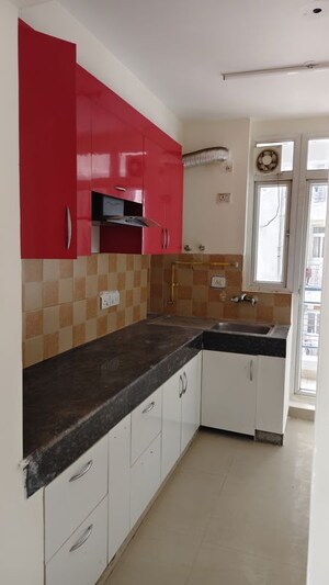 Kitchen in 2 BHK Apartment at Great Value Sharanam, Sector 107 – for Rent