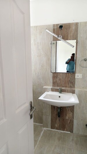 Bathroom in 2 BHK Apartment at Great Value Sharanam, Sector 107 – for Rent