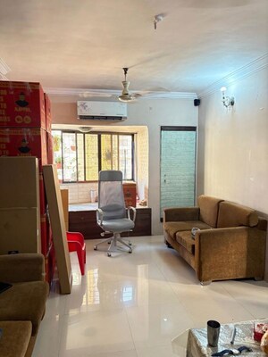 Living Room in 2 BHK Apartment at Royal Classic Co Op Society, Andheri West – for Rent