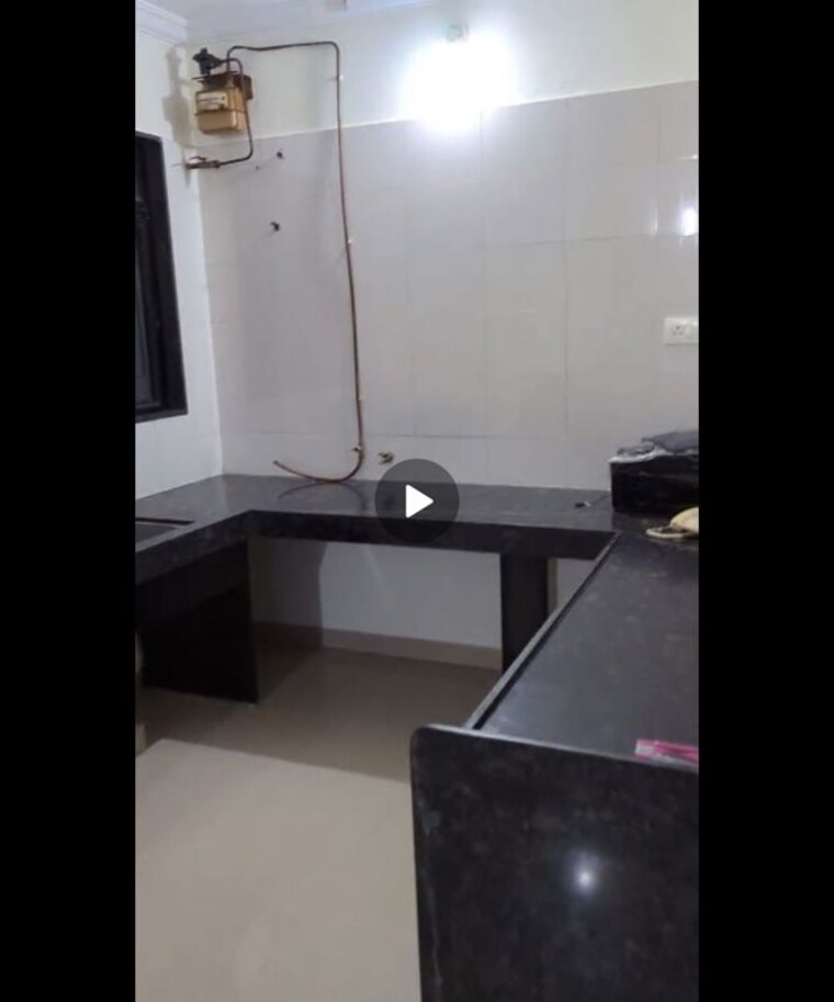 Kitchen, mont-vert-seville-phase-i 2 Bedroom 950 Sq.Ft. Apartment In Wakad Pune 10206826