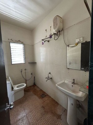 Bathroom in 3 BHK Apartment at Vijaydeep Deccan Gold, Kharadi – for Rent